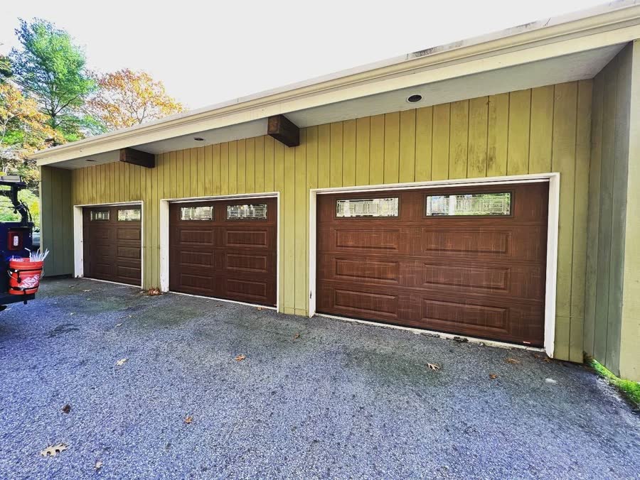 Three bay garage with matching wood look doors